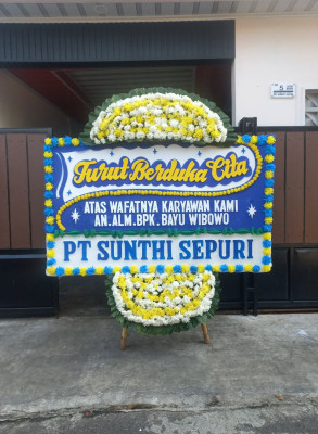 Papan Bunga Duka di Dorong