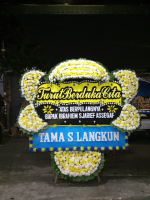 Papan Bunga Duka di Dorong
