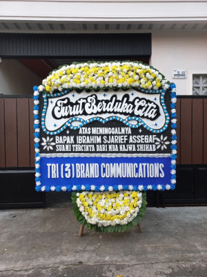 Papan Bunga Duka di Dorong